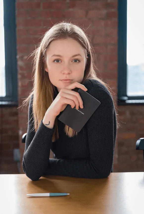 Developer working on JavaScript frameworks at her desk