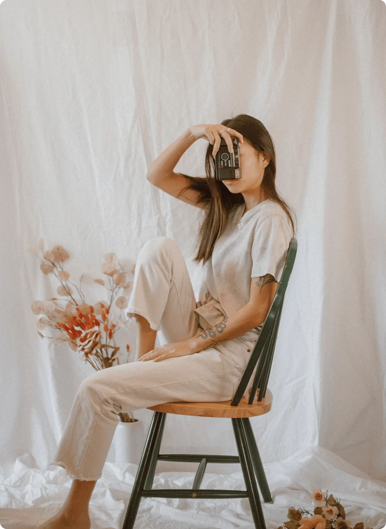 Photographer working with equipment in a creative workspace